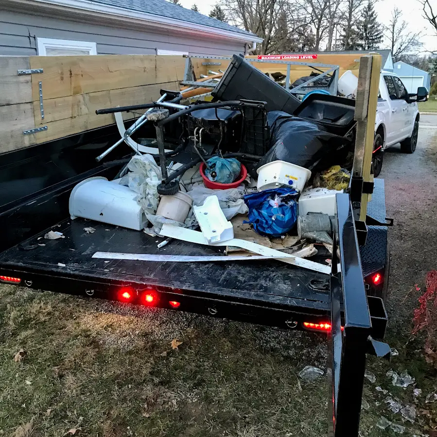 Roll-off dumpster delivered to a residential driveway in Candler-McAfee